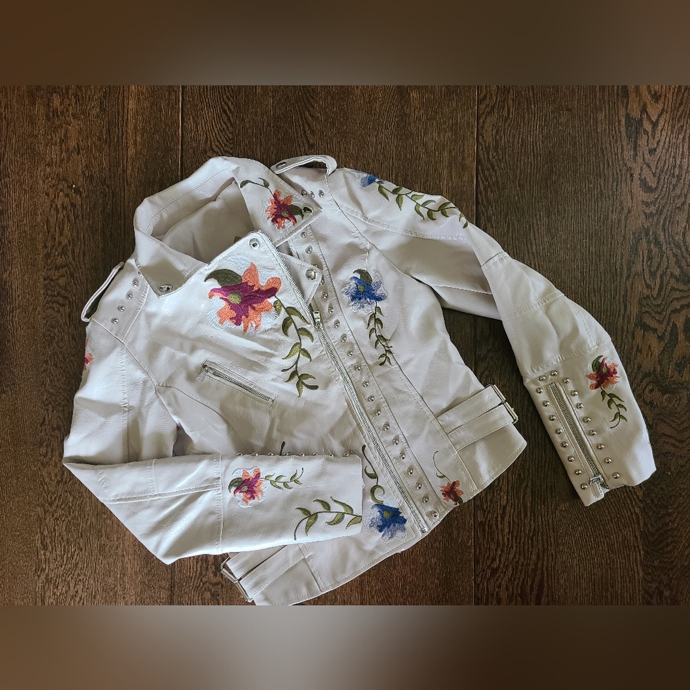 Cute little jacket here! Embroidered.  NWT!